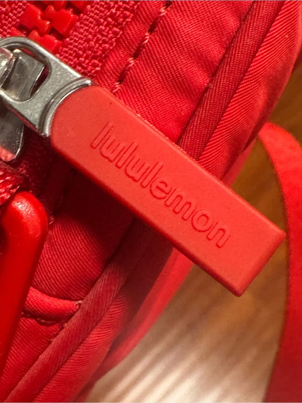 Lululemon Women’s Red Crossbody or belt bag. Zippered, outside phone pocket